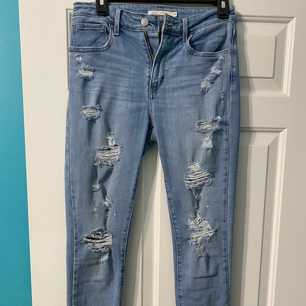 High waisted distressed jeans